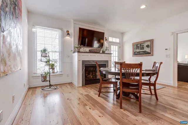 a kitchen with stainless steel appliances granite countertop a sink stove and microwave