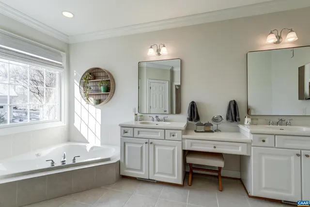 a bedroom with bed and a window