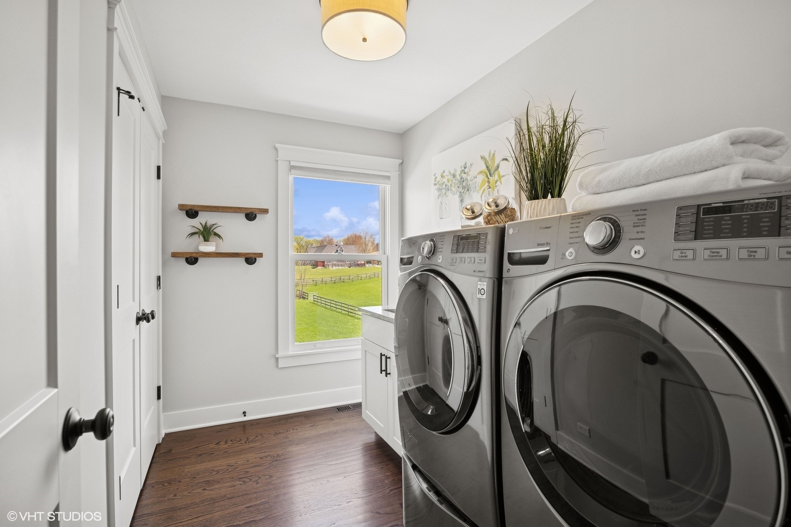59 Ridge Road Barrington Hills, IL 60010 - Photo 19 of 44 a utility room with dryer and washer