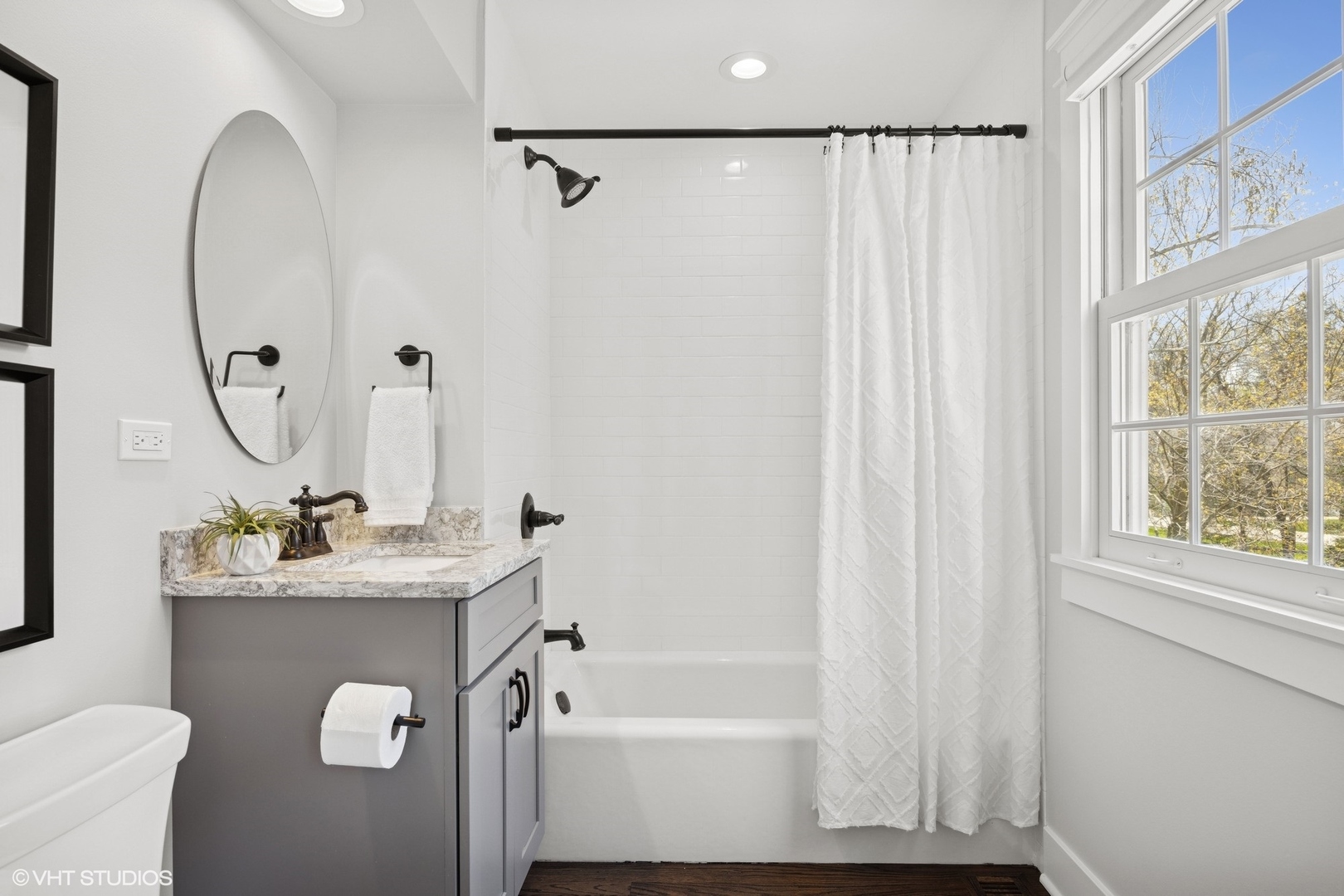 59 Ridge Road Barrington Hills, IL 60010 - Photo 23 of 44 a bathroom with a sink a toilet and a mirror