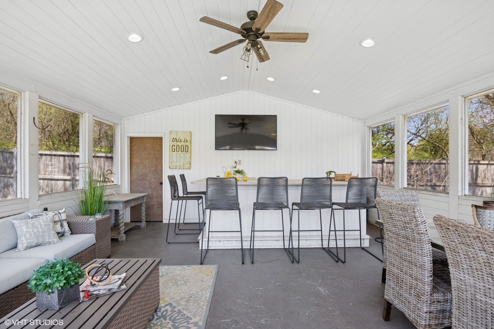 59 Ridge Road Barrington Hills, IL 60010 - Photo 31 of 44 a living room with furniture a flat screen tv and a large window