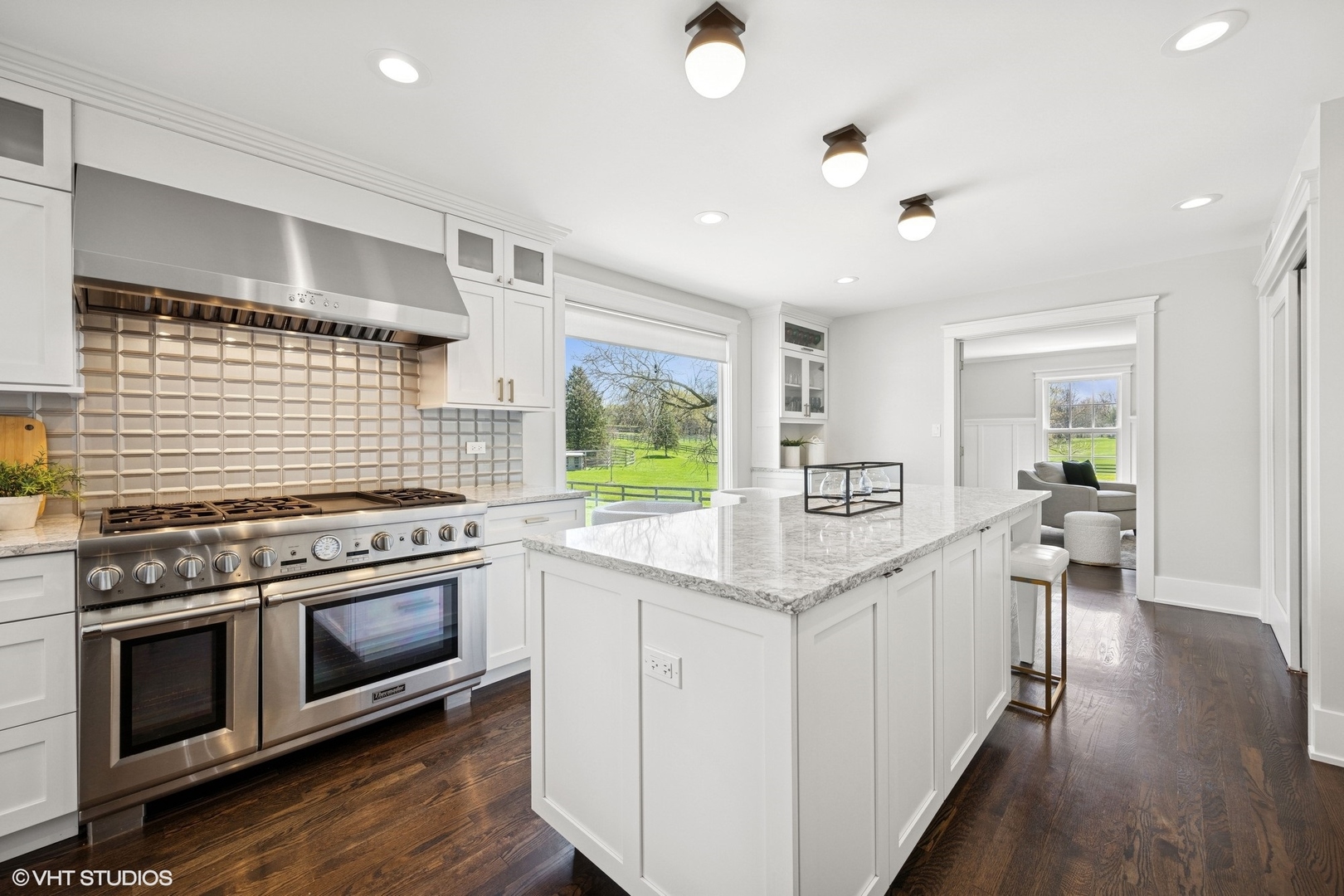 59 Ridge Road Barrington Hills, IL 60010 - Photo 8 of 44 a kitchen with stainless steel appliances and wooden cabinets