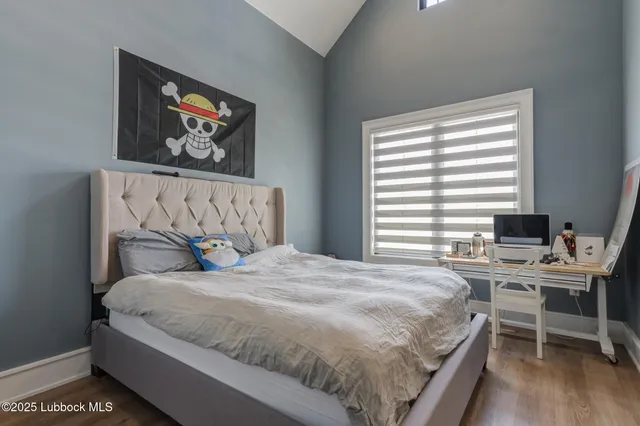 a view of walk in closet with clothes