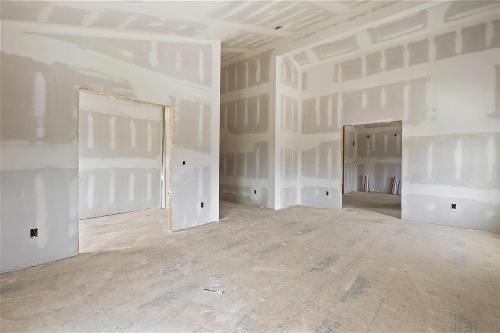 6848 Silver Maple Drive Rex, GA 30273 - Photo 11 of 38 an empty room with windows and entrance