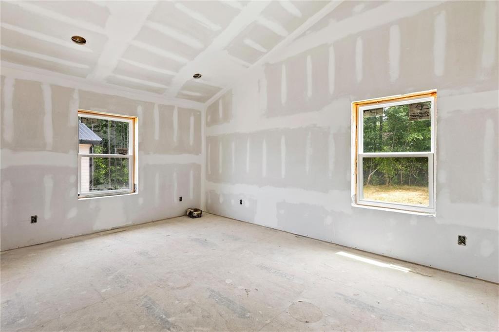 6848 Silver Maple Drive Rex, GA 30273 - Photo 16 of 38 an empty room with windows