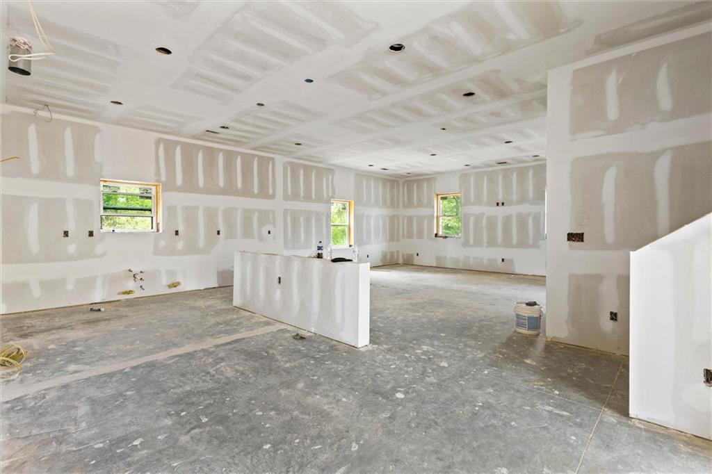 6848 Silver Maple Drive Rex, GA 30273 - Photo 21 of 38 a view of a kitchen with a refrigerator and a sink