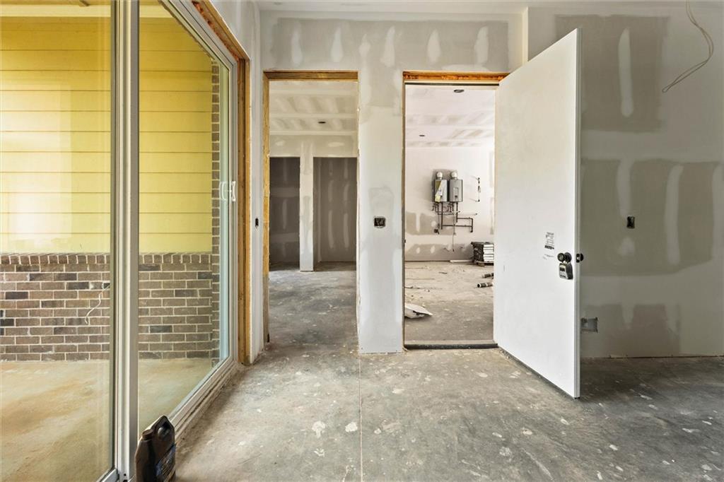 6848 Silver Maple Drive Rex, GA 30273 - Photo 22 of 38 a view of a bathroom with a glass door shower