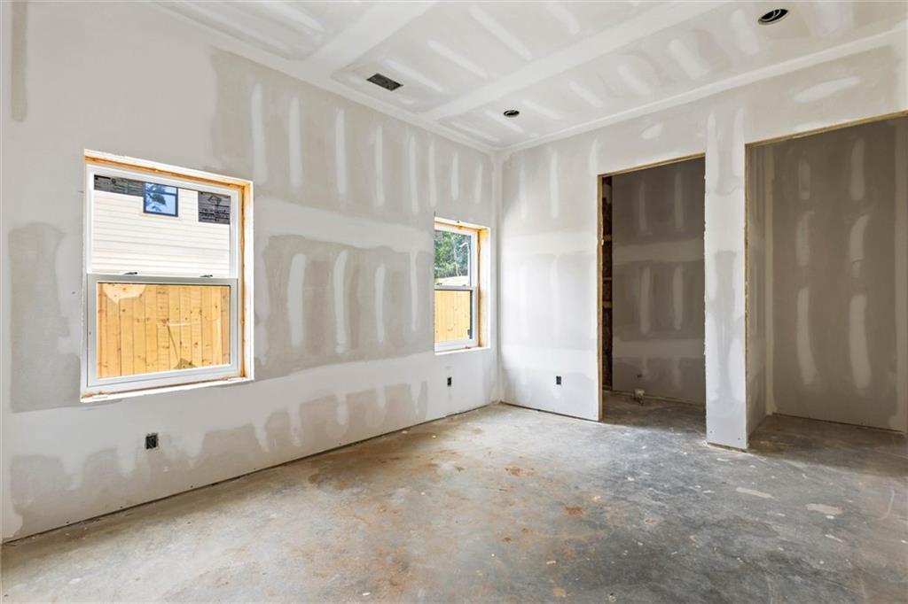 6848 Silver Maple Drive Rex, GA 30273 - Photo 23 of 38 a view of an empty room with a window