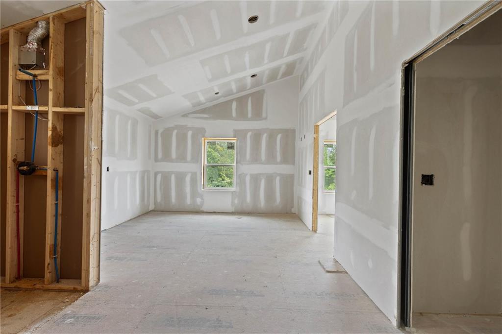 6848 Silver Maple Drive Rex, GA 30273 - Photo 27 of 38 view of empty room with windows