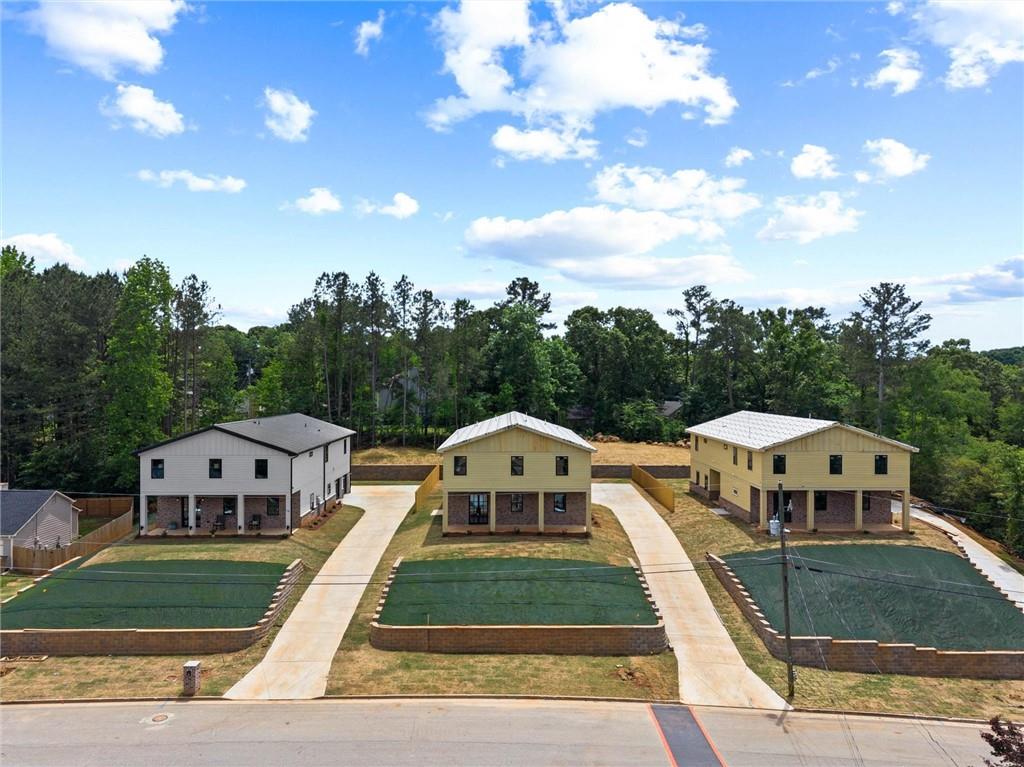 6848 Silver Maple Drive Rex, GA 30273 - Photo 33 of 38 an aerial view of a house with a yard