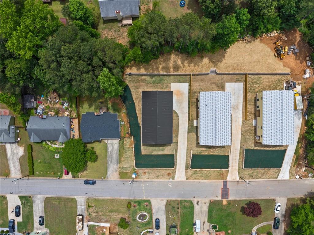 6848 Silver Maple Drive Rex, GA 30273 - Photo 36 of 38 an aerial view of a house with a yard and potted plants