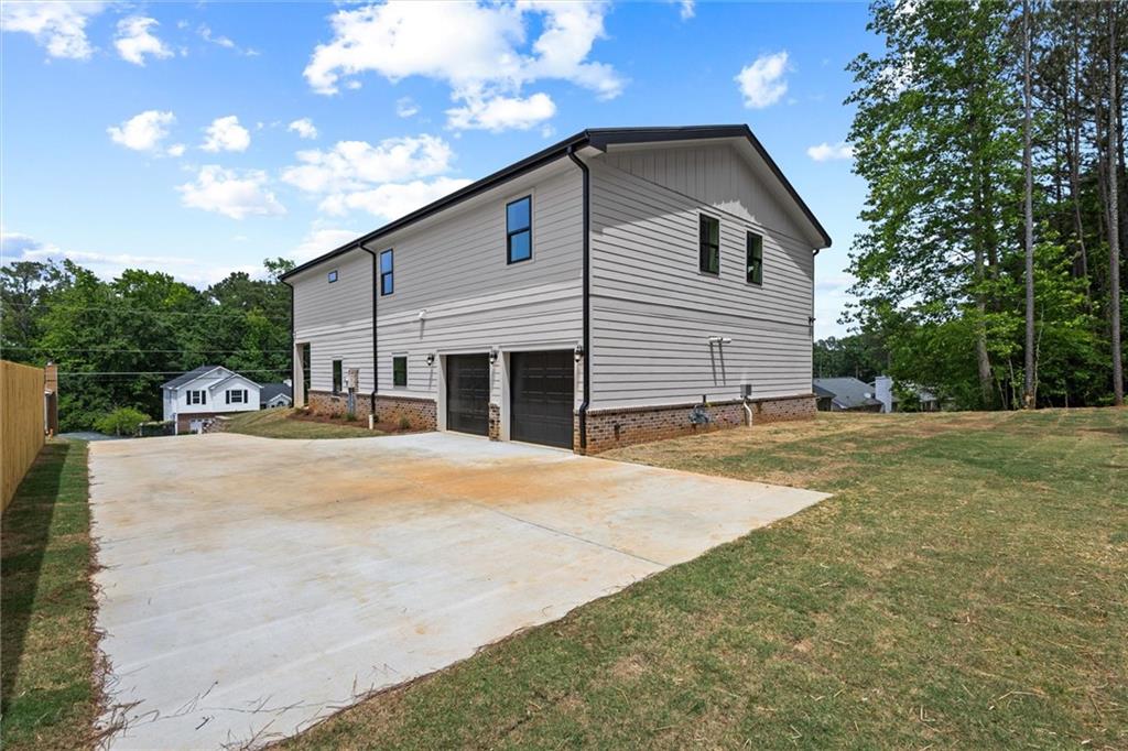 6848 Silver Maple Drive Rex, GA 30273 - Photo 4 of 63