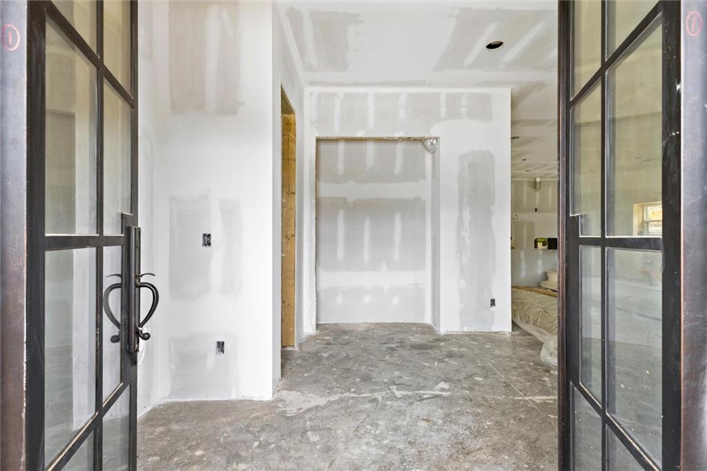 6848 Silver Maple Drive Rex, GA 30273 - Photo 4 of 38 a bathroom with a shower and a glass door