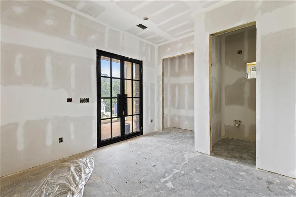 6848 Silver Maple Drive Rex, GA 30273 - Photo 5 of 38 a view of a bathroom with a tub shower and bathroom