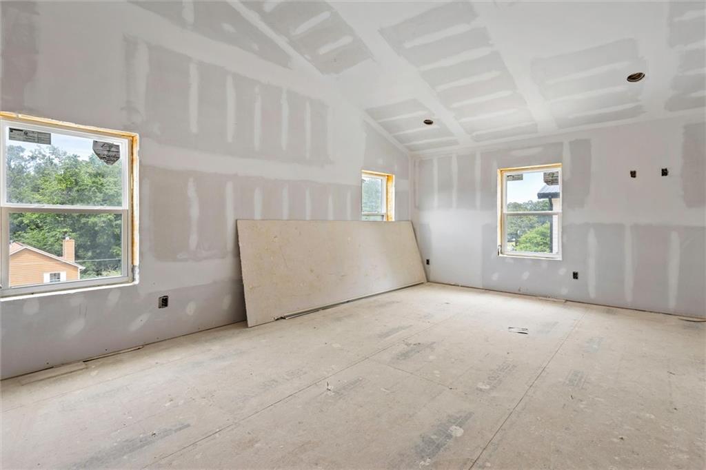 6848 Silver Maple Drive Rex, GA 30273 - Photo 10 of 38 a view of an empty room with a window