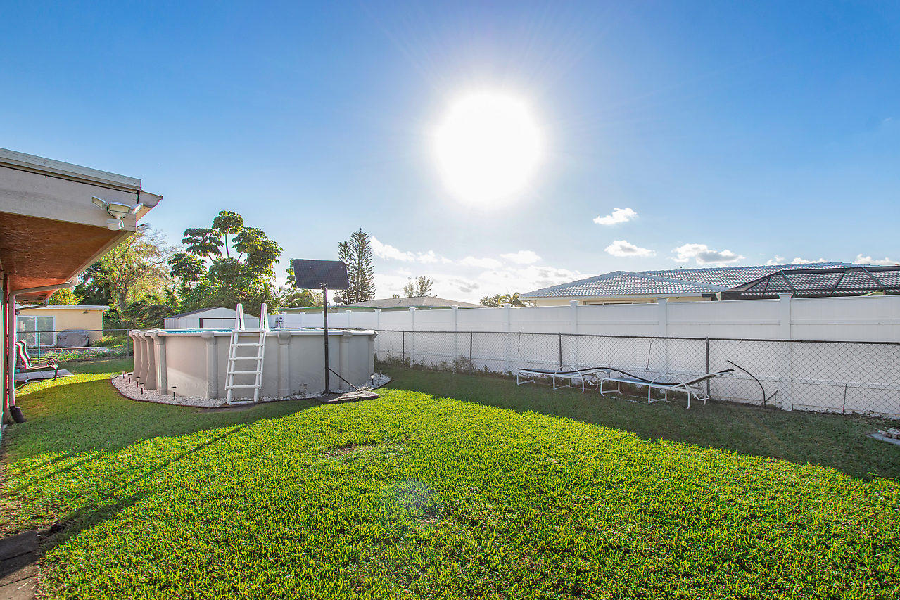 22045 Aquila Street Boca Raton, FL 33428 - Photo 23 of 24 a view of a back yard