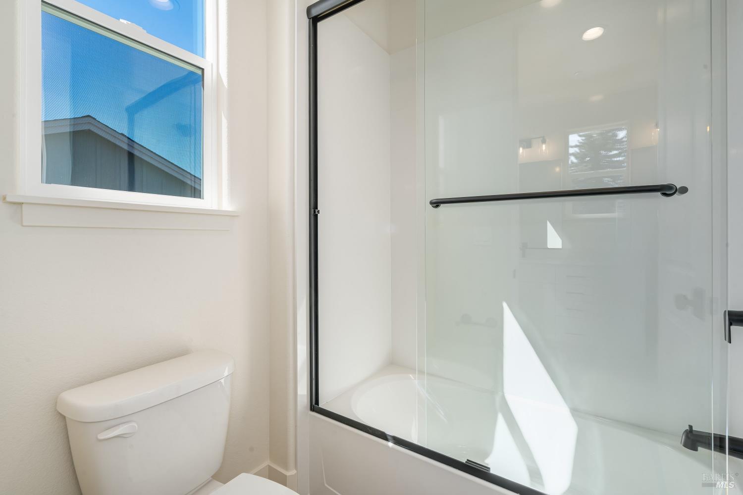 3461 Ruston Lane Napa, CA 94558 - Photo 16 of 22 a bathroom with a toilet and a shower