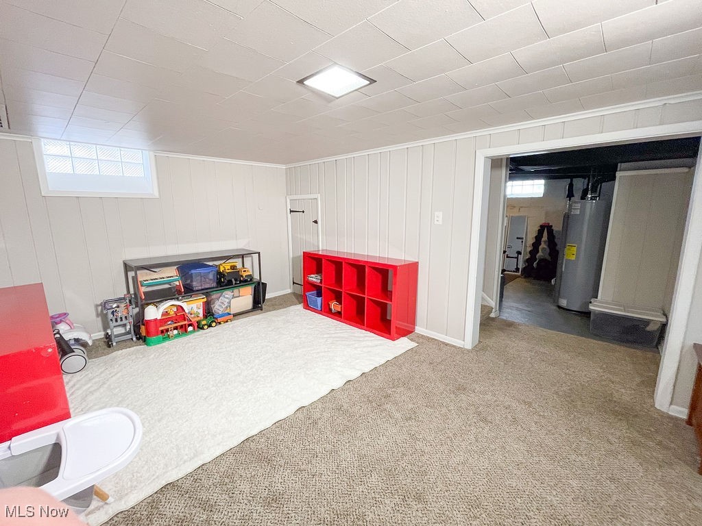 2707 Hearthstone Road Cleveland, OH 44134 - Photo 42 of 49 Rec room with water heater and carpet