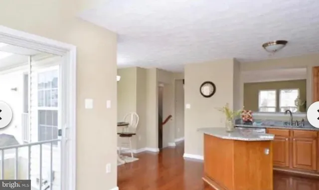 a bathroom with a double vanity sink mirror and shower