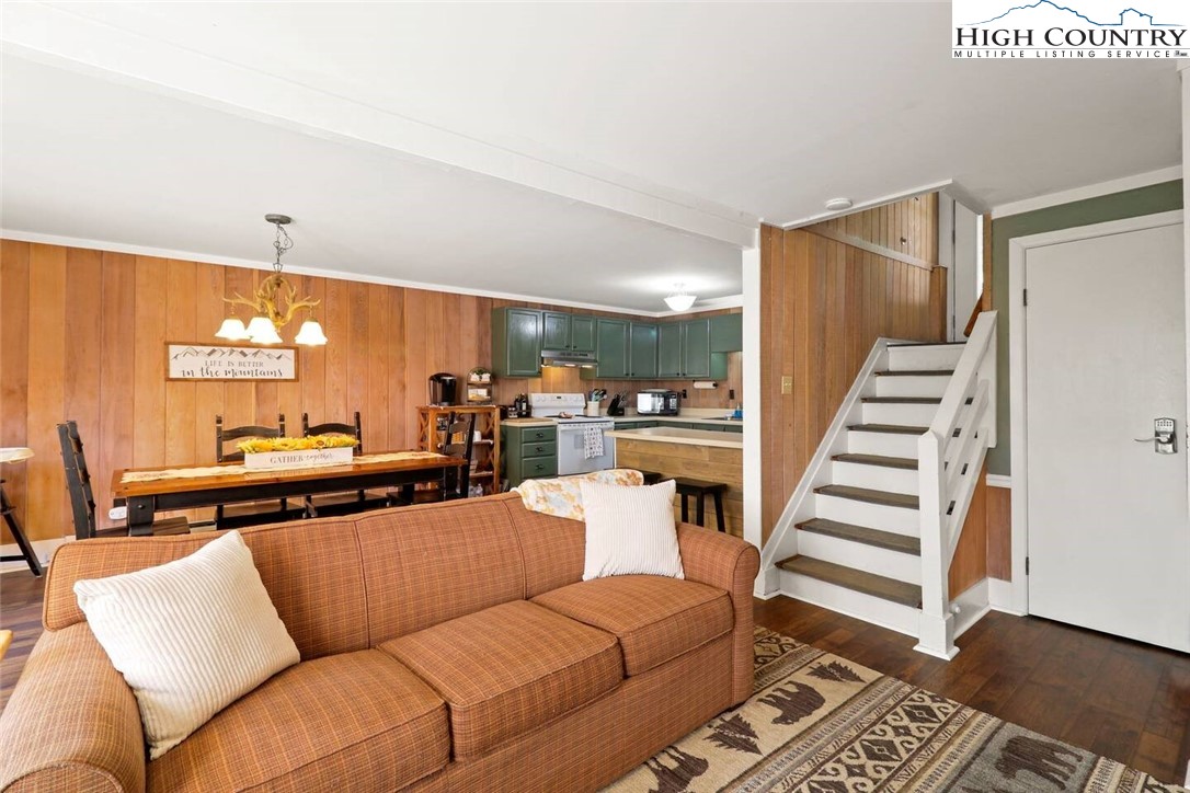220 Charter Hills Road, Unit B1 Beech Mountain, NC 28604 - Photo 7 of 26 a living room with furniture and wooden floor