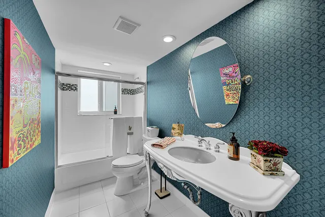 a view of a patio with couches chairs and a yard