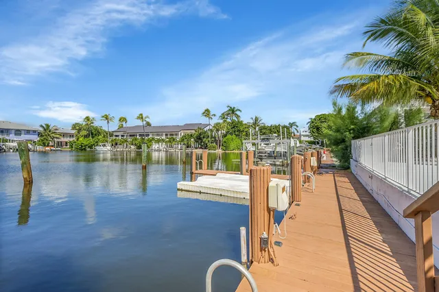 an aerial view of a house with outdoor space