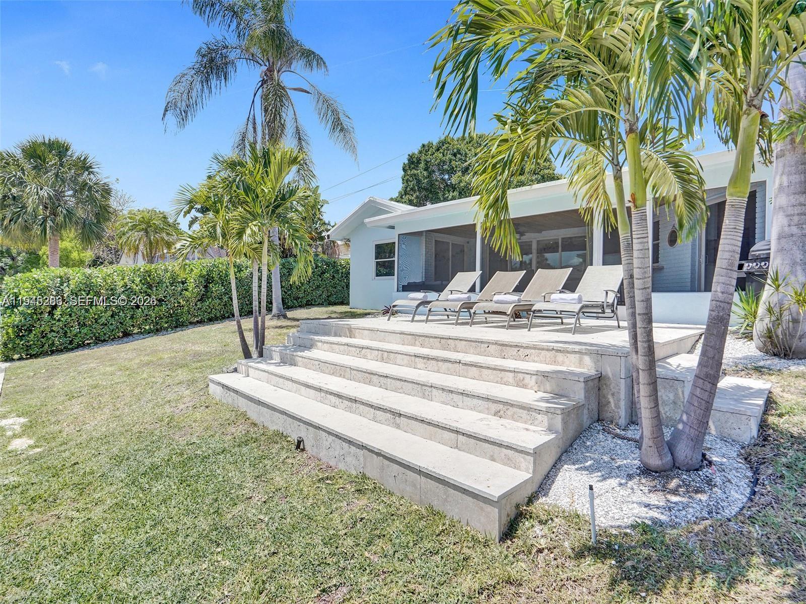 620 West Palmetto Park Road Boca Raton, FL 33486 - Photo 36 of 38 a view of a house with a patio
