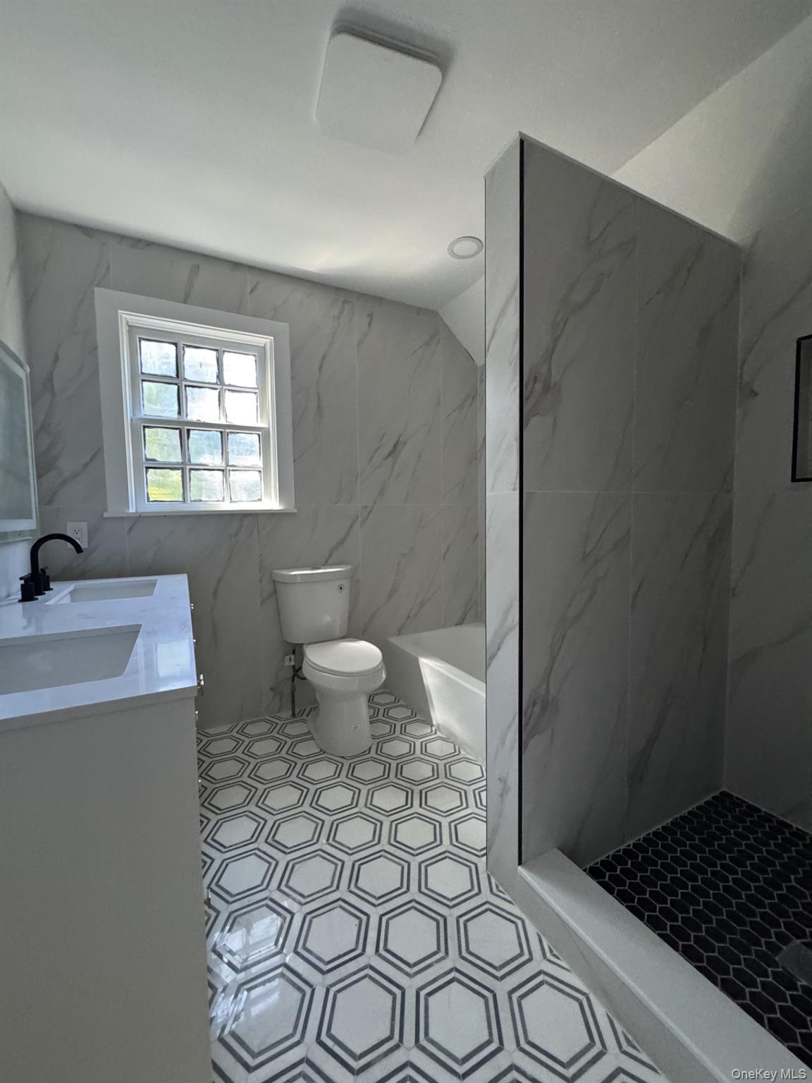 506 Midland Avenue Rye, NY 10580 - Photo 13 of 15 a bathroom with a sink toilet and shower