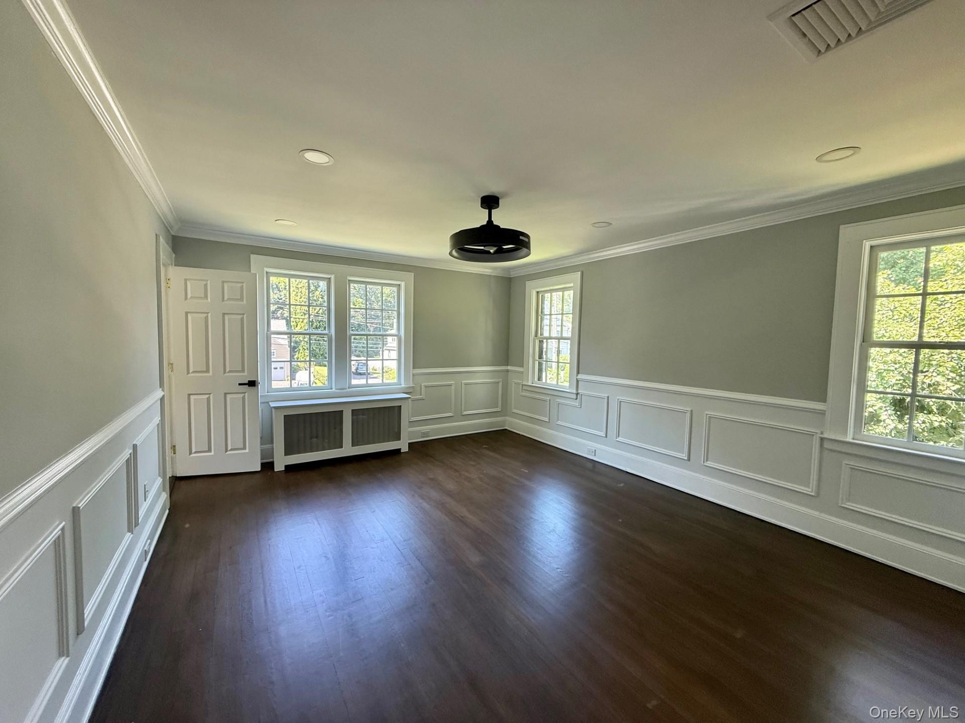 506 Midland Avenue Rye, NY 10580 - Photo 10 of 15 wooden floor in an empty room with a window