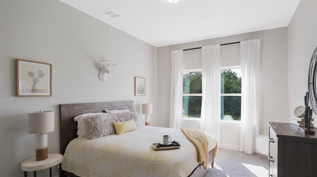 Lot 12 Ridgeway Trail Johnson City, TX 78636 - Photo 11 of 26 a bedroom with bed and a window