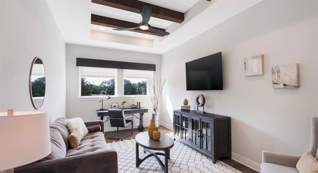 Lot 12 Ridgeway Trail Johnson City, TX 78636 - Photo 13 of 26 a living room with furniture and a flat screen tv