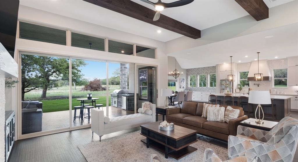 Lot 12 Ridgeway Trail Johnson City, TX 78636 - Photo 6 of 26 a living room with furniture and a large window