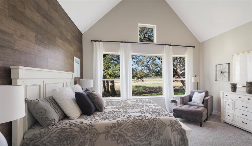 Lot 12 Ridgeway Trail Johnson City, TX 78636 - Photo 8 of 26 a bedroom with a bed and a couch