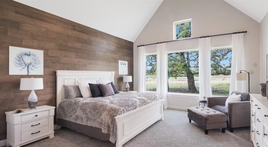 Lot 12 Ridgeway Trail Johnson City, TX 78636 - Photo 9 of 26 a bedroom with a bed and a couch