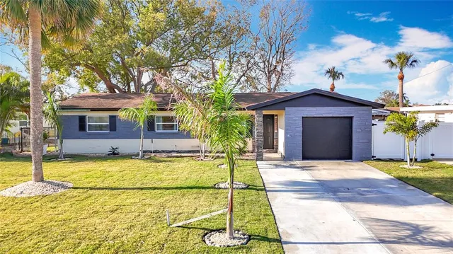 a view of a house with a swimming pool