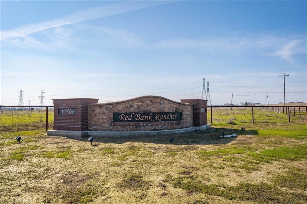 a view of a swimming pool with a yard