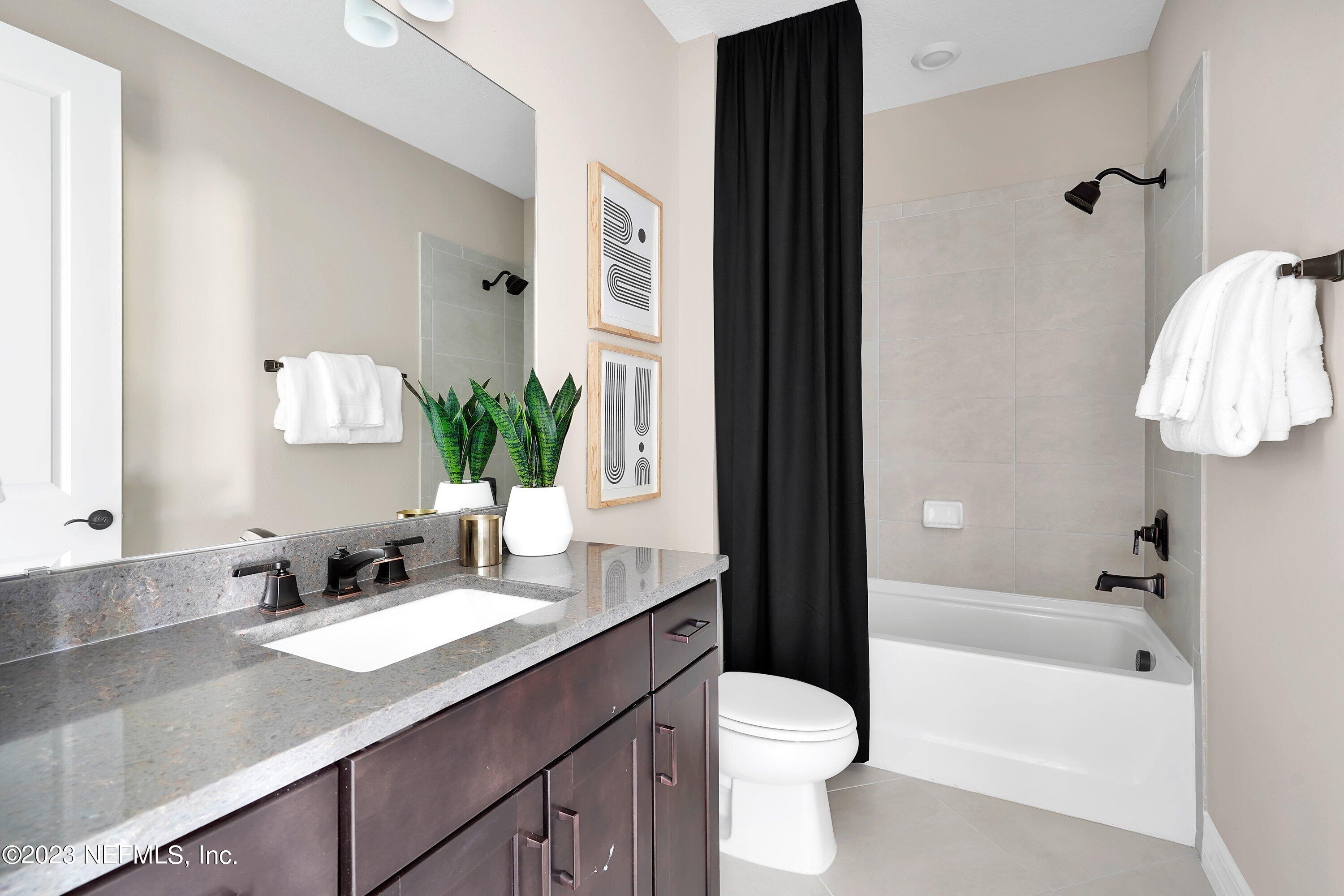 664 Continuum Loop Yulee, FL 32097 - Photo 17 of 26 Hallmark Secondary Bathroom