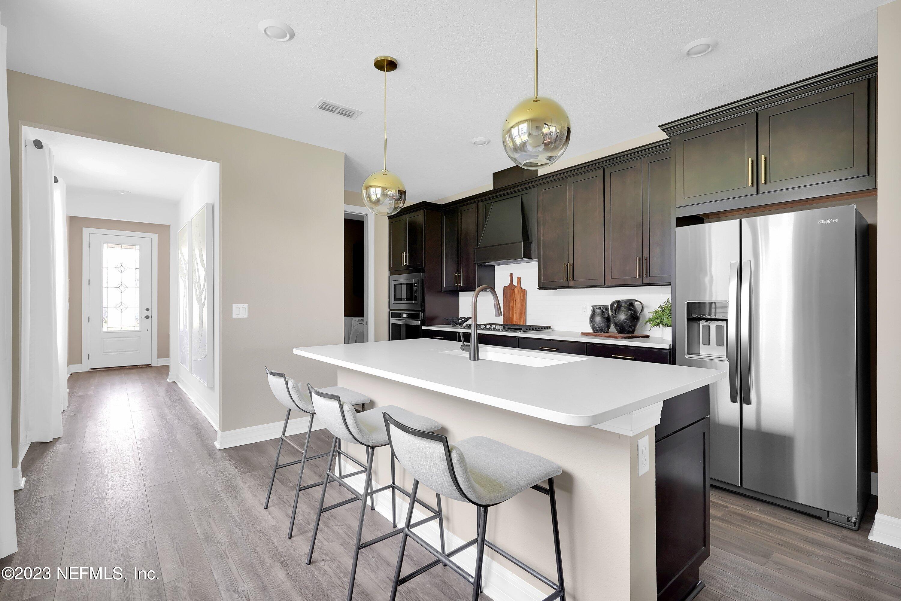 664 Continuum Loop Yulee, FL 32097 - Photo 6 of 26 Hallmark Kitchen