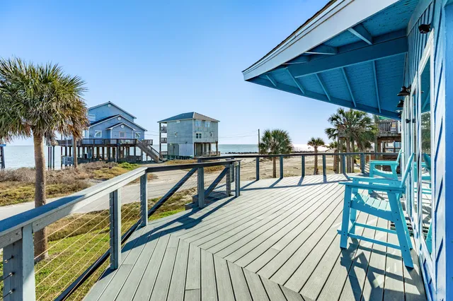 a view of a balcony with chairs
