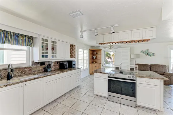 a bedroom with bed and window