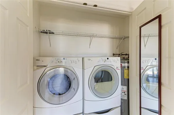 a view of a balcony with wooden floor