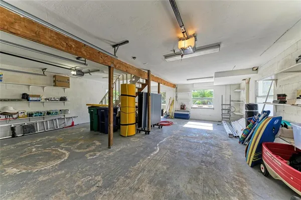 a view of a balcony with furniture