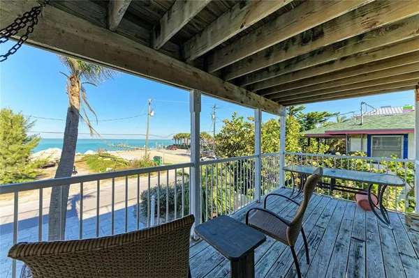 a view of a terrace with a bench