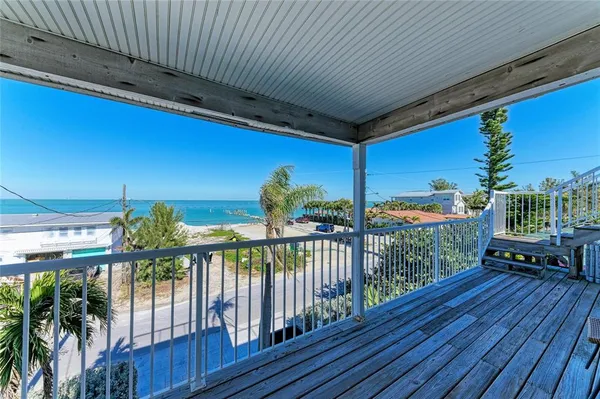 a view of a balcony with an outdoor space