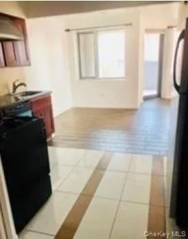 a bathroom with a sink vanity mirror and toilet