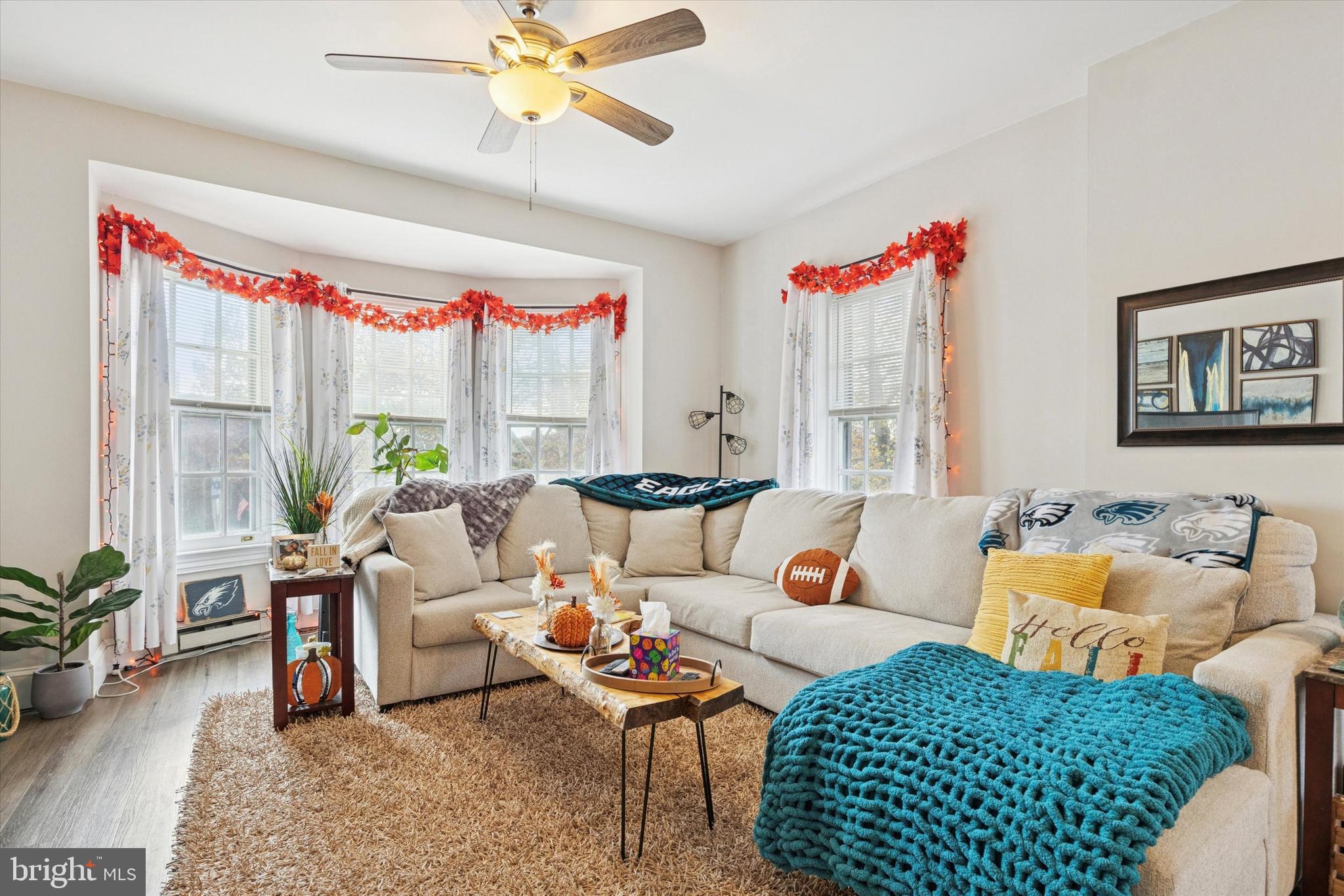 641 East High Street, Unit 2 Pottstown, PA 19464 - Photo 8 of 15 a living room with furniture and a large window