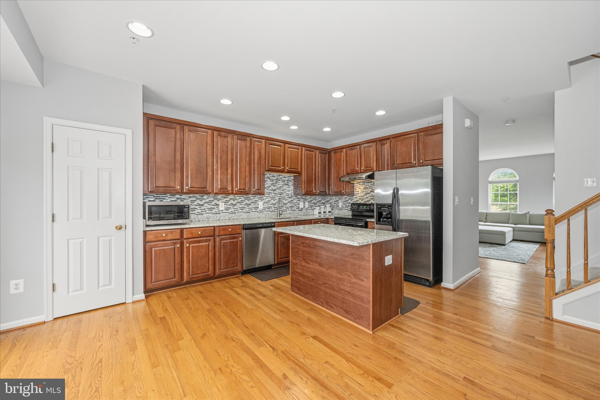 21 Inkberry Circle Gaithersburg, MD 20877 - Photo 15 of 51 a kitchen with stainless steel appliances granite countertop a refrigerator and a stove top oven