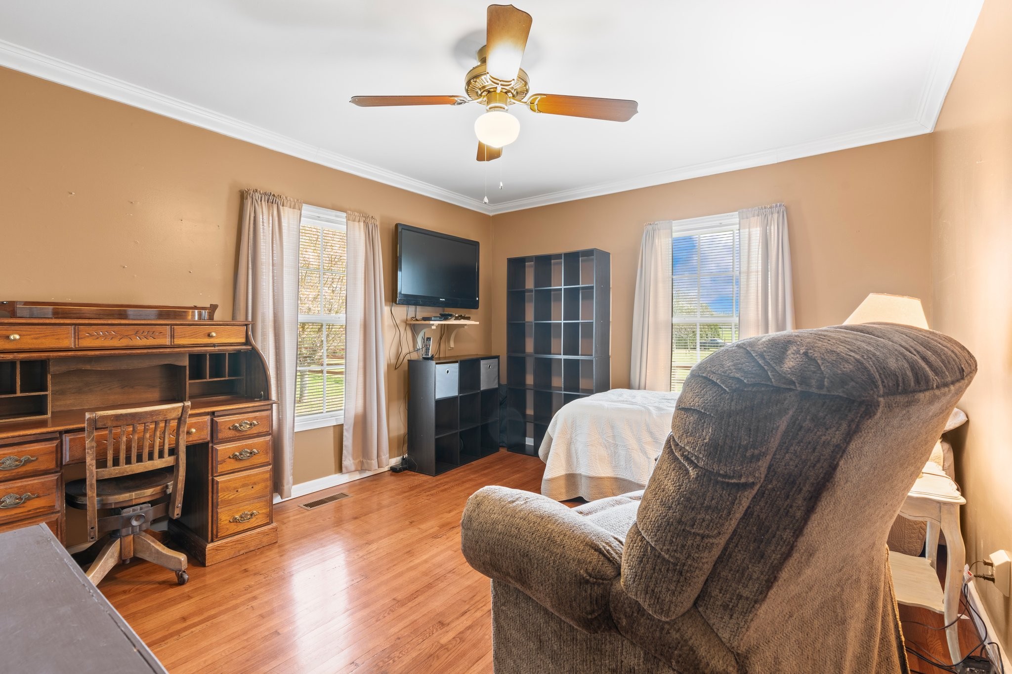 4239 Sixteenth Model Road Manchester, TN 37355 - Photo 27 of 56 a living room with furniture a fireplace and a flat screen tv