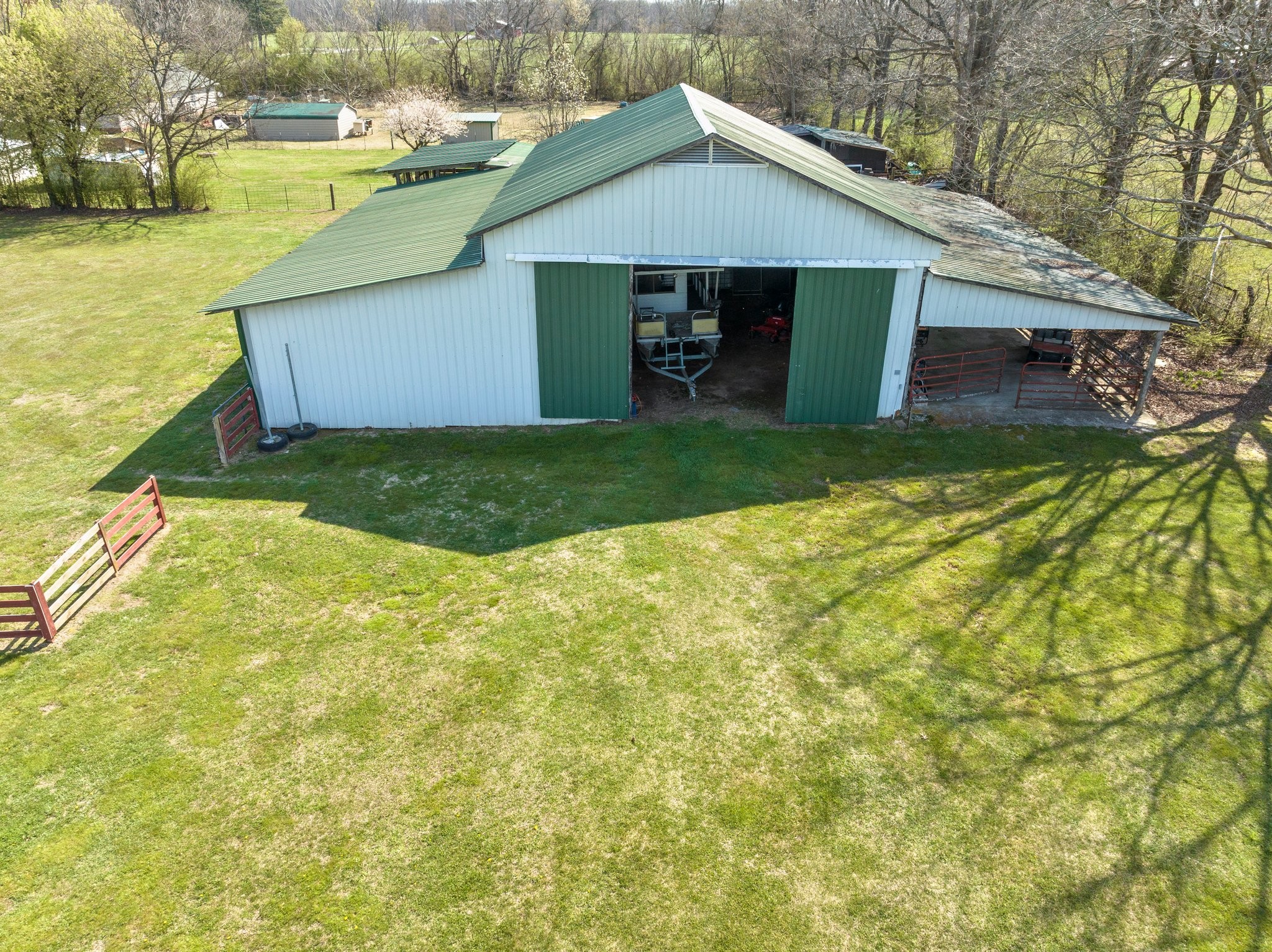 4239 Sixteenth Model Road Manchester, TN 37355 - Photo 45 of 56 a front view of house with yard and garage