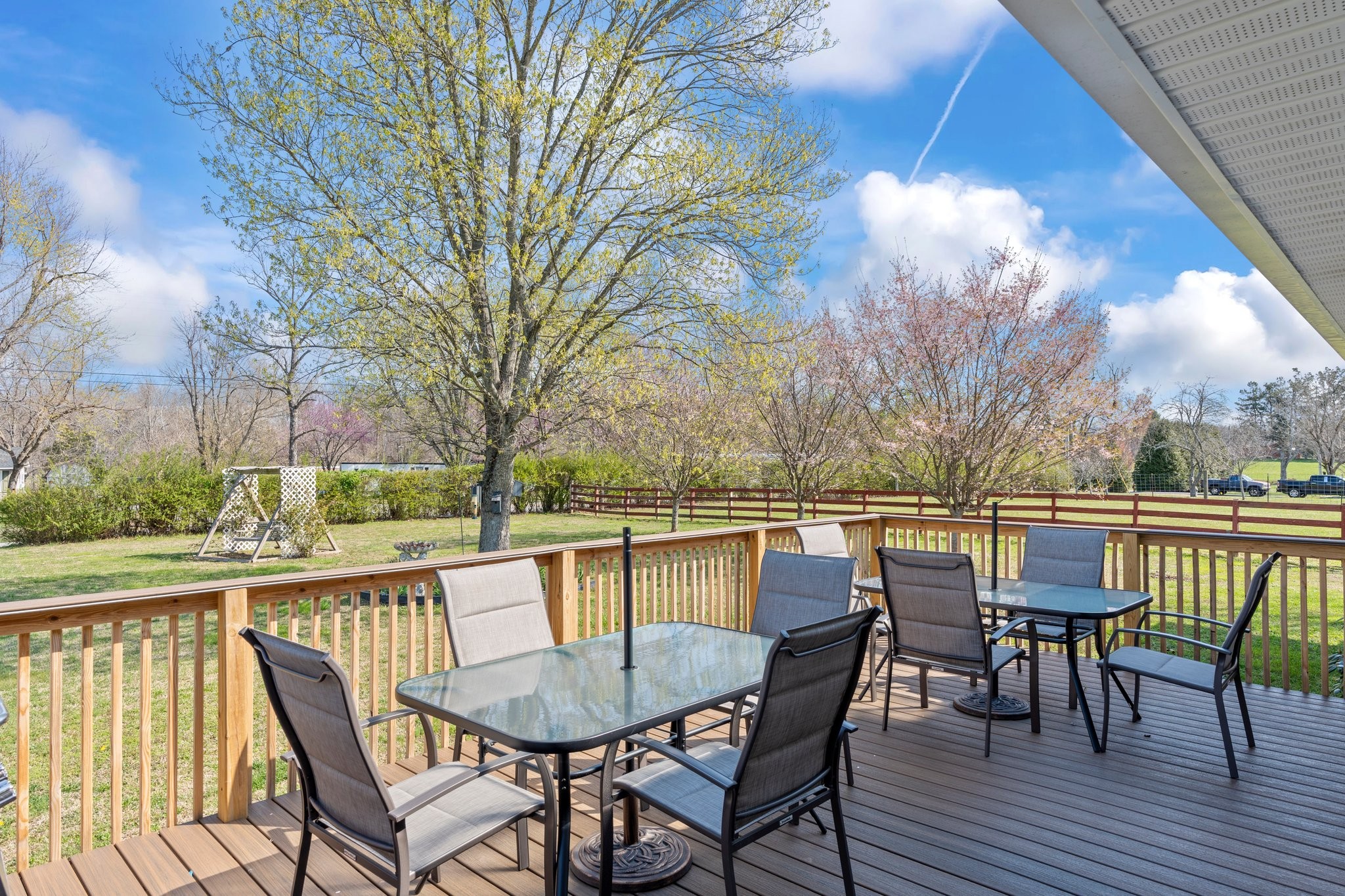 4239 Sixteenth Model Road Manchester, TN 37355 - Photo 5 of 56 a view of a chairs and table on the deck
